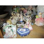 Large collection of various late 19th and early 20th Century porcelain fairing type figures and