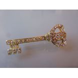 18ct Yellow gold diamond set pendant / brooch in the form of a key