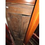 Early 19th Century oak hanging corner cabinet having two panelled doors enclosing shelf interior