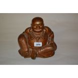 Oriental patinated metal figure of a seated Buddha