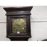 18th Century fruitwood longcase clock with a square hood above a rectangular panel door and