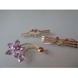 18ct Gold amethyst brooch and two 9ct gold bar brooches