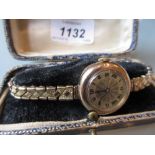 Ladies 9ct gold cased wristwatch by Buren with plated strap