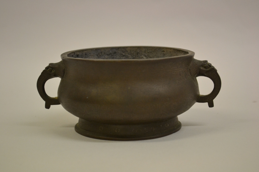 Small 19th Century Chinese bronze baluster form two handled censer with elephant mask head side - Image 3 of 14