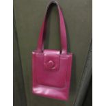 Ladies Cartier burgundy leather handbag in original box
