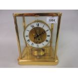 Jaeger Le Coultre Atmos clock with gilt brass four glass case