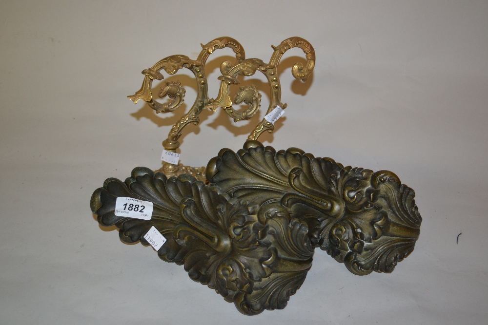 Two pairs of gilt brass curtain tie-backs