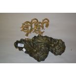 Two pairs of gilt brass curtain tie-backs