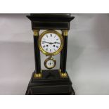 19th Century French ebonised portico clock,