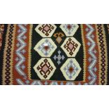 Kelim rug with geometric design together with two similar flat weave rugs