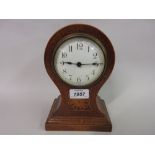 Edwardian oak and inlaid balloon shaped mantel clock with enamel dial and Arabic numerals