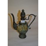 Chinese dark patinated and gilt bronze ewer decorated with figures in relief, 10,
