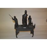 Late 19th Century Japanese dark patinated bronze group of three geishas standing on a table,