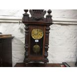 Mahogany cased Vienna style wall clock with two train spring driven movement