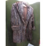 Ladies three quarter length dark brown fur coat