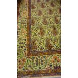 Tabriz carpet with an all-over design of large Boteh on ivory ground with floral borders,