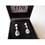 Pair of 18ct white and yellow gold aquamarine and diamond drop earrings