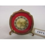 Small early 20th Century dressing table strut clock with ormolu frame