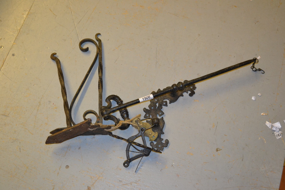Wrought iron bell pull (lacking bell) with pulley etc.