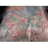Floral pattern bedspread together with four matching cushions