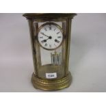 19th Century French engraved brass oval four glass library clock,