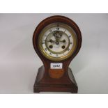 Edwardian mahogany line and shell inlaid balloon shaped two train mantel clock