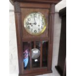 20th Century oak Vienna style wall clock with circular silvered dial,