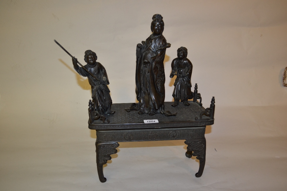 Late 19th Century Japanese dark patinated bronze group of three geishas standing on a table, - Image 2 of 2