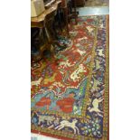 Indo Persian carpet having central medallion surrounded by various animals with multiple borders
