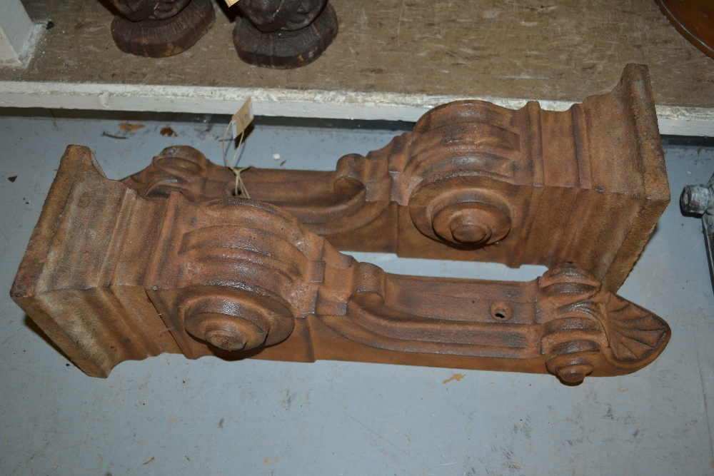 Pair of 19th Century cast iron consoles