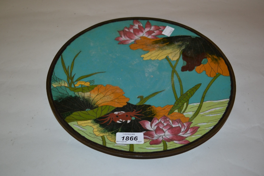 Japanese cloisonne plate decorated with flowers and foliage on a turquoise blue ground
