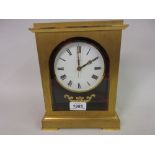 Modern brass cased mantel clock with quartz movement by Looping