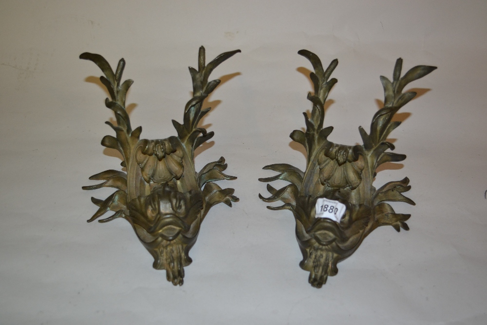 Pair of dark patinated bronze wall appliques in the form of fish and foliage adapted for use as