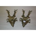 Pair of dark patinated bronze wall appliques in the form of fish and foliage adapted for use as