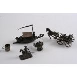 MINIATURES OR TOYS: A horse & buggy, a boat with a hinged cover, a mug, a basket of flowers & a