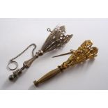 A MID 19TH CENTURY POSY HOLDER with a hexagonal baluster stem & a suspensory ring & chain,