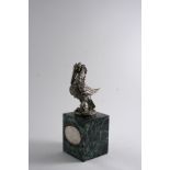 BY LESLIE G. DURBIN: A modern cast sculpture in the form of a stylised pelican, in her piety, on a