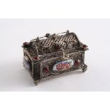 A 19TH CENTURY SMALL FILIGREE CASKET set with four small enamelled panels & paste bosses, unmarked;
