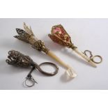 A VICTORIAN POSY HOLDER with pierced & embossed floral decoration & grapes, a suspension chain