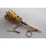 A 19TH CENTURY GILT-METAL & MOTHER OF PEARL POSY HOLDER with floral decoration & turquoise coloiured
