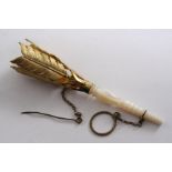 A MID 19TH CENTURY GILT-METAL POSY HOLDER with a turned mother of pearl handle & stylised arrows