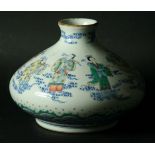 A CHINESE WUCAI VASE squat baluster body, painted with a continuous scene of immortals amongst