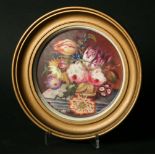 AN ENGLISH PORCELAIN CIRCULAR PLAQUE c. 1830, painted with a basket of flowers on a marble ledge,