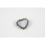 A VICTORIAN OPAL AND DIAMOND BROOCH the heart-shaped opal is set within a surround of old