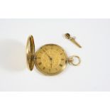 AN 18CT. GOLD FULL HUNTING CASED POCKET WATCH the gold foliate dial with Roman numerals (glass