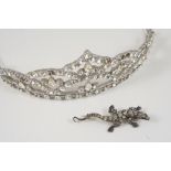 A PASTE SET TIARA set overall with circular and pear-shaped white paste stones, together with a