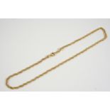 AN 18CT. GOLD TWISTED LINK NECKLACE 44cm. long, 12.9 grams.