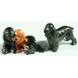 A ROYAL WORCESTER SPANIEL, model 2944, date cipher 1950, in black, gilt marks; together with a group