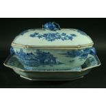 A CHINESE EXPORT TUREEN AND COVER 18th century style, blue painted with landscapes between rabbit