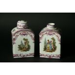 A PAIR OF FRENCH TEA CANISTERS and cover, 20th century of domed rectangular form painted with scenes